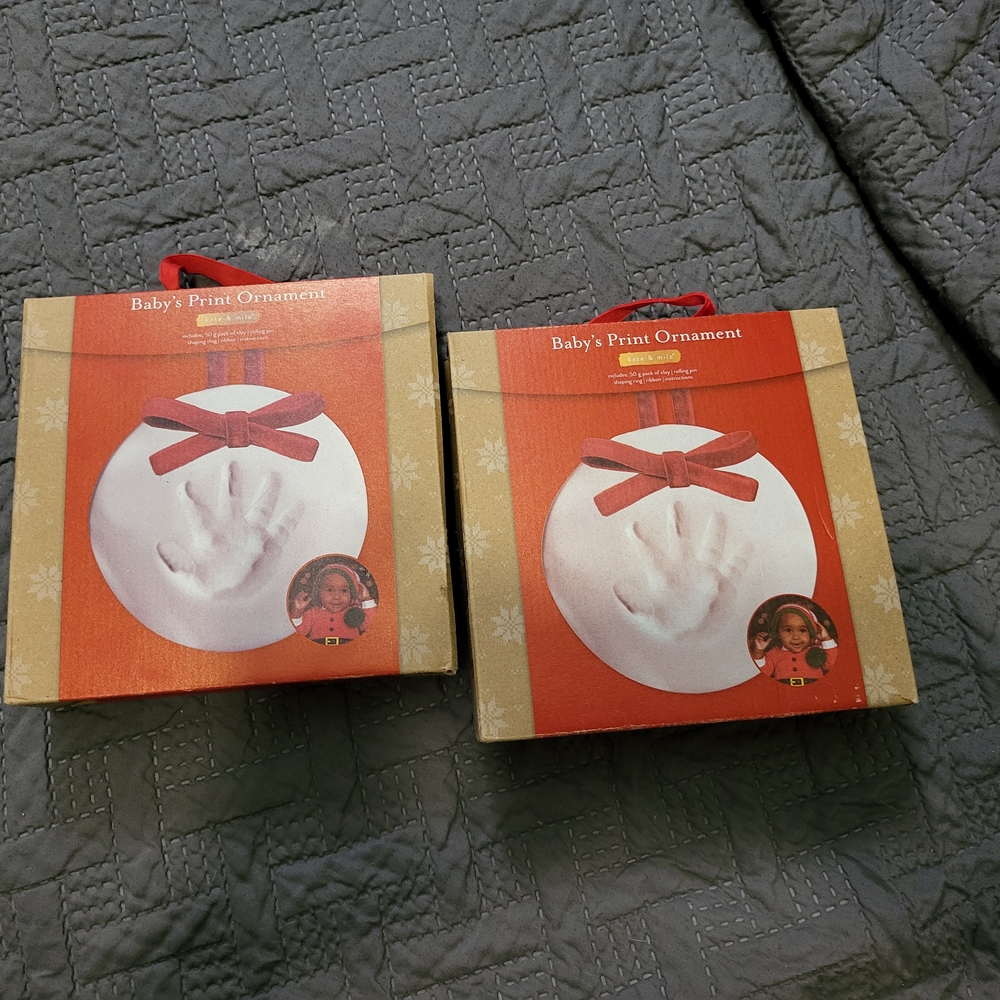 Baby's Print Ornament with Red Ribbon